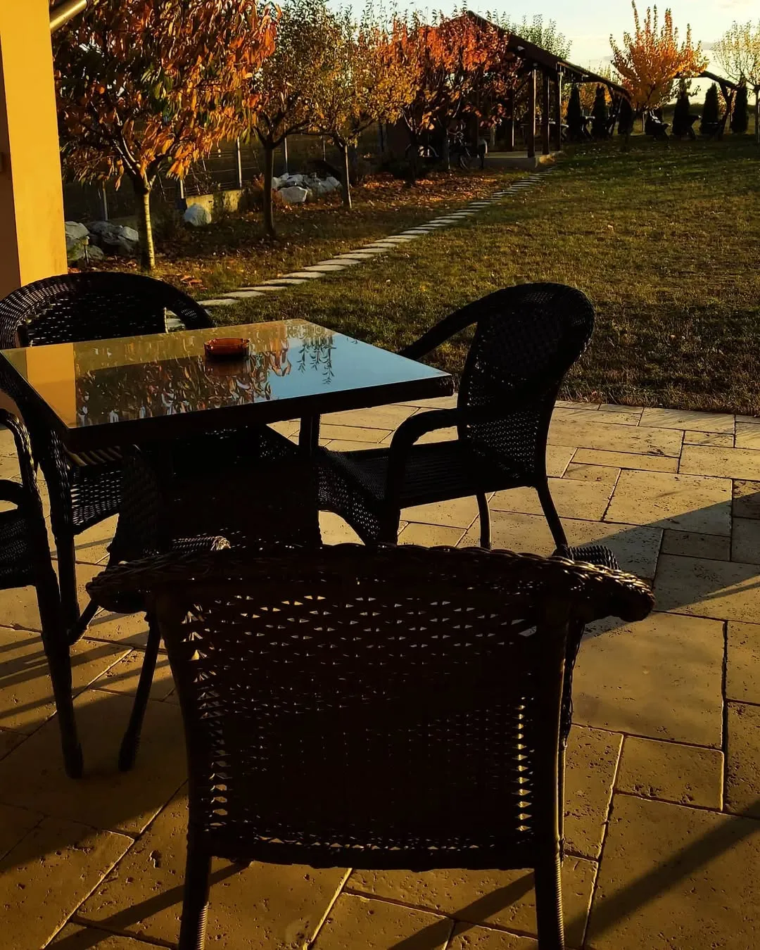 Terrace table in warm autumn sunset light